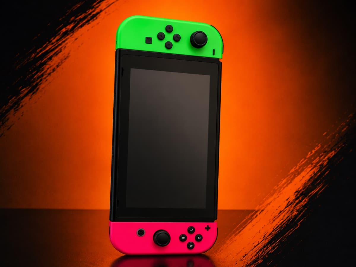 🎮 Nintendo Switch – Joy-Con Vert & Rose – Occasion